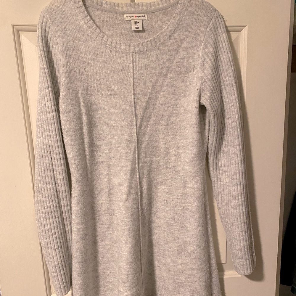 This cozy gray sweater dress is perfect for fall and winter